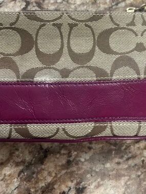 Coach - Tan Signature Canvas Wristlet with Plum Leather Stripe